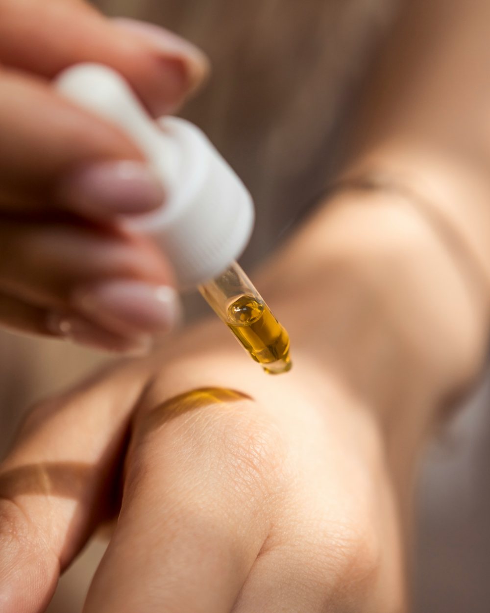 Face oil applied with a dropper